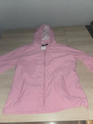 Chubasquero rosa sin usar