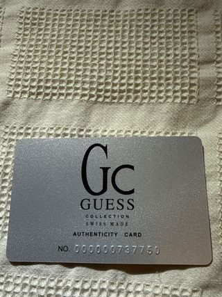 Reloj Guess Collection Cronógrafo Negro y Dorado