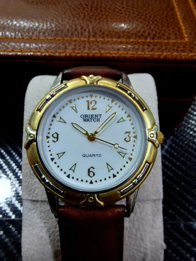 Reloj Orient chapado oro 23k 36mm cuarzo