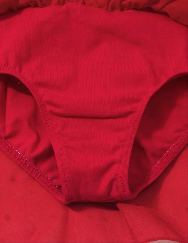 Body pattinaggio rosso con strass