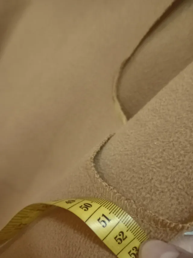 Capa beige sin mangas