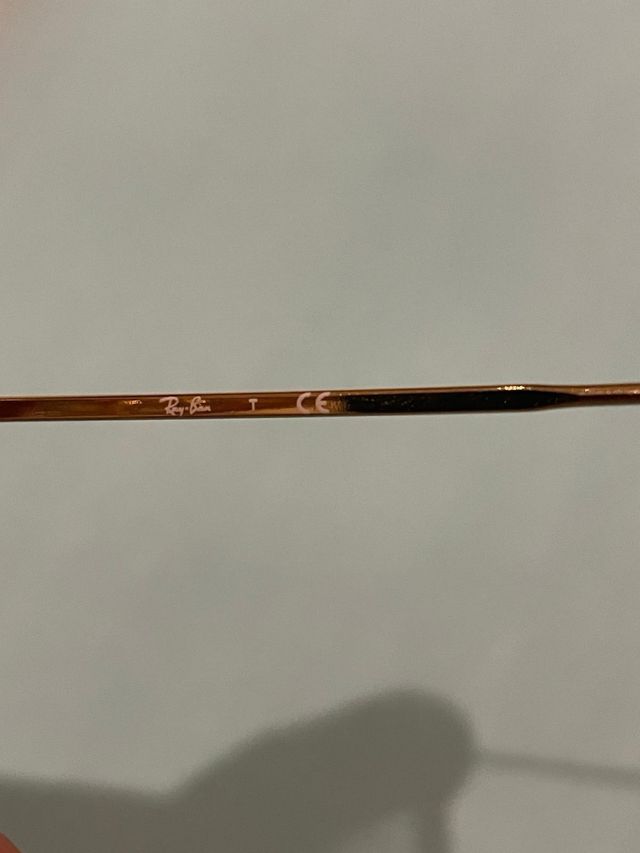 Gafas Ray-Ban doradas y marrones