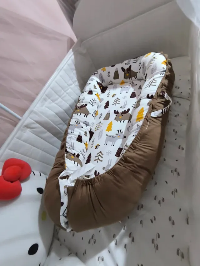 Nido para bebé con estampado de animales