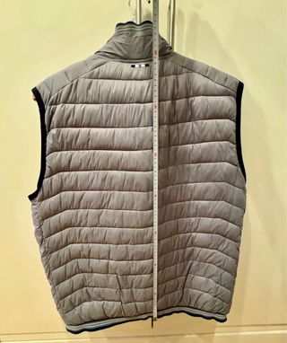 Chaleco acolchado gris plumas