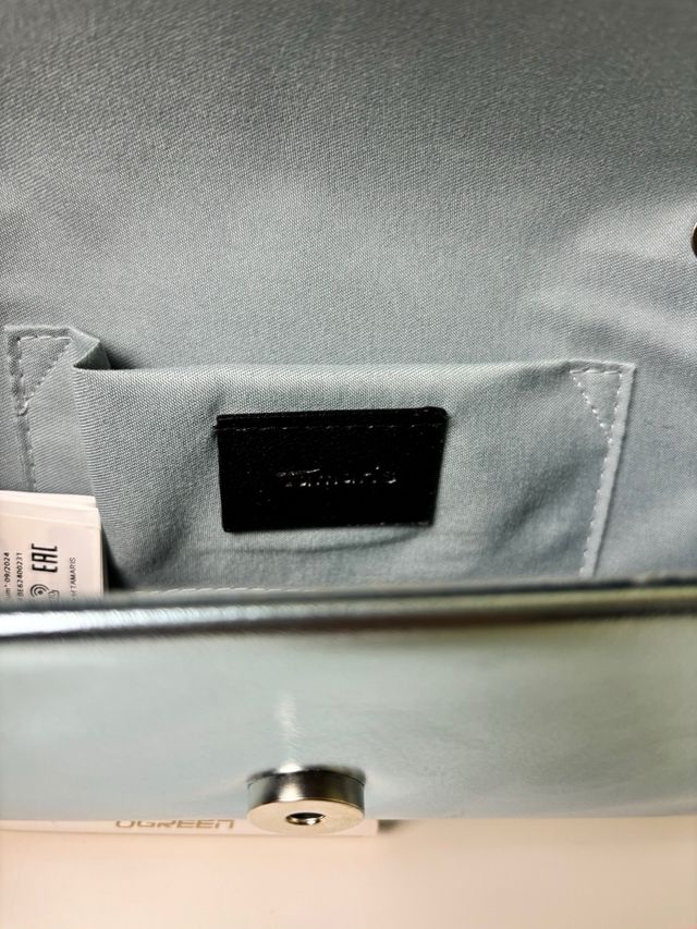 Clutch Tamaris metálico azul cadena elegante