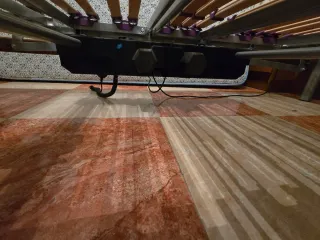 Cama con somier de madera y metal