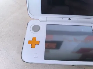 New Nintendo 2DS XL Naranja y Blanco