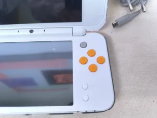 New Nintendo 2DS XL Naranja y Blanco