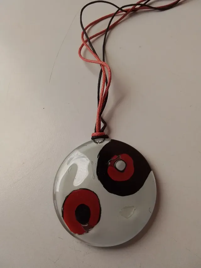 Colgante redondo blanco con círculos