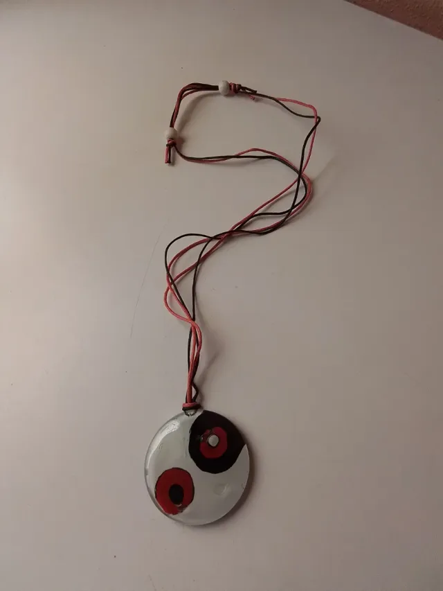 Colgante redondo blanco con círculos