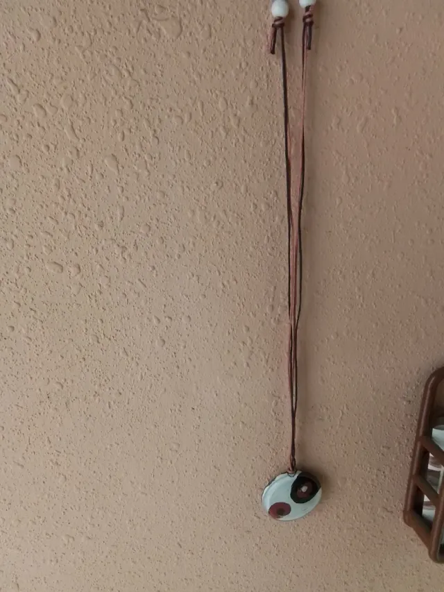 Colgante redondo blanco con círculos