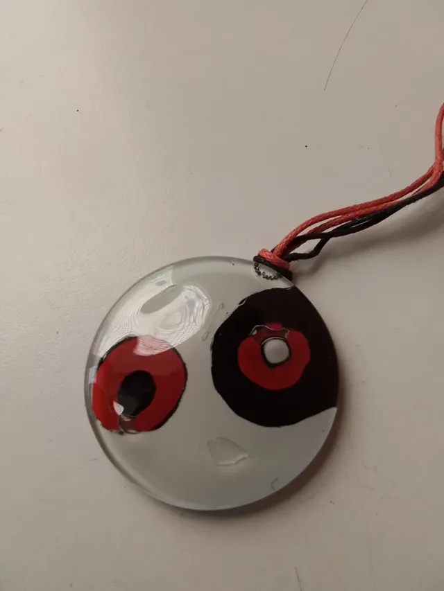 Colgante redondo blanco con círculos