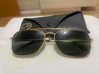Gafas de sol Ray-Ban doradas y verdes