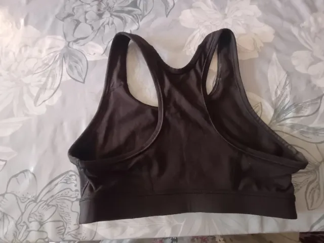 Top deportivo Puma negro y plateado original