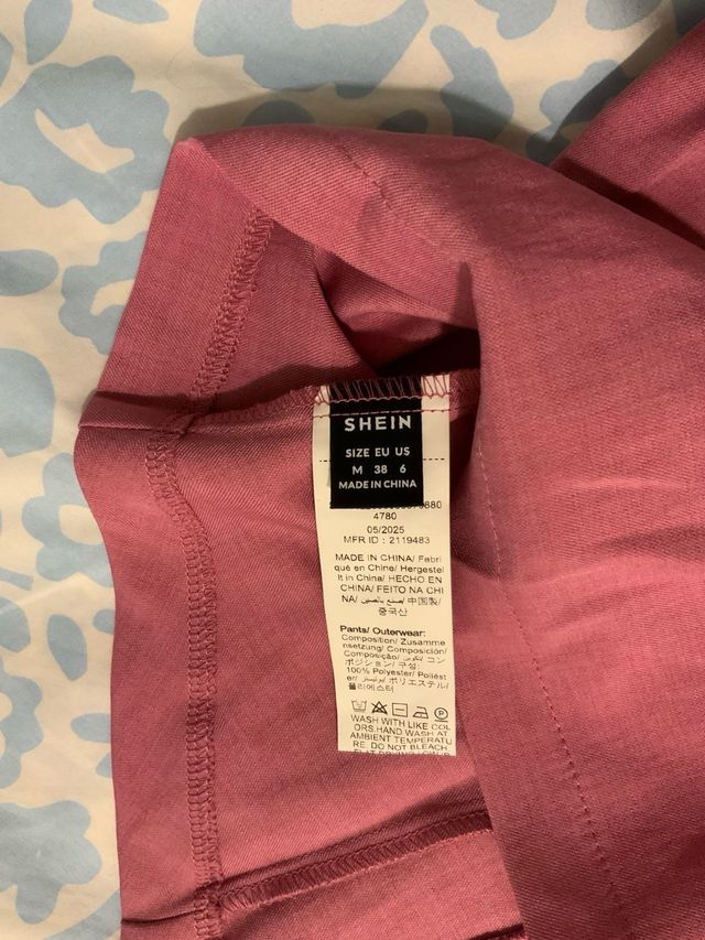 Conjunto chaleco y pantalón rosa / fucsia