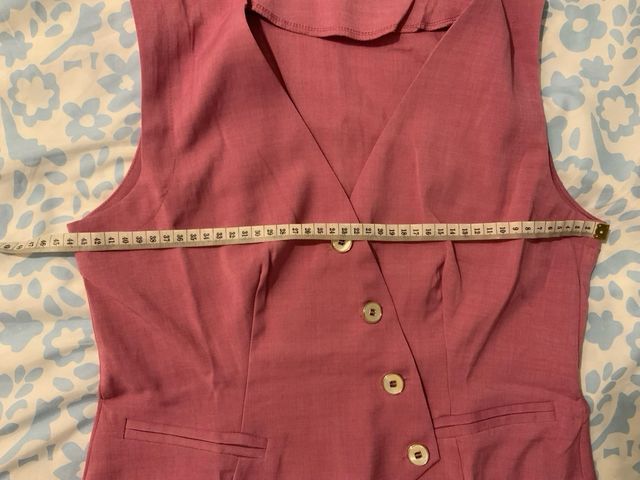 Conjunto chaleco y pantalón rosa / fucsia