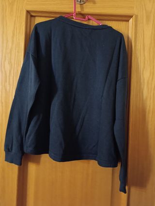 Jersey negro con lentejuelas doradas LIKE