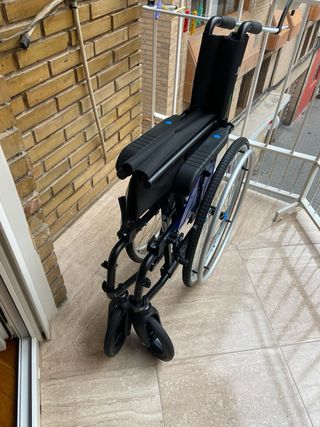 Silla de ruedas y Cojín ortopédico