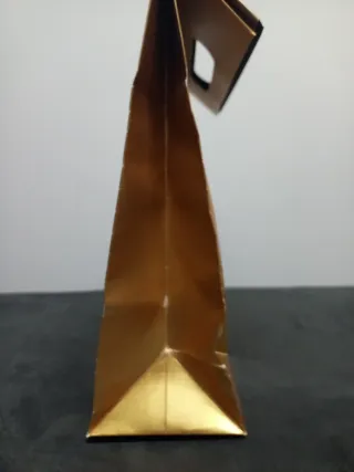 Busta Saint Laurent dorata 29x30cm