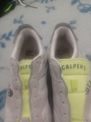 Zapatos Scalpers blancos y amarillos