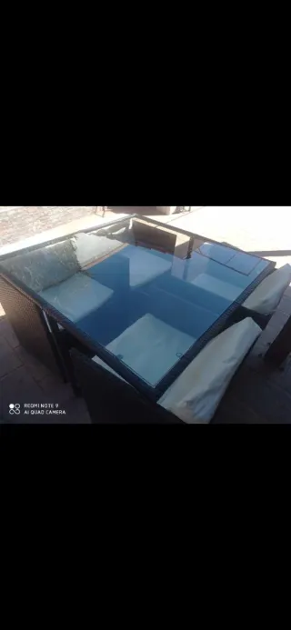 Conjunto mesa y sillas terraza ratán y cristal
