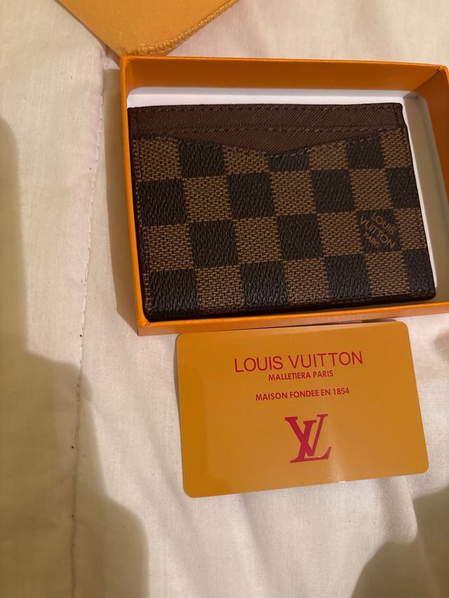 Cartera  Naranja Nueva perfecta calidad y sin usar