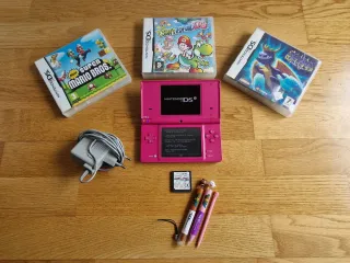 Nintendo DS Rosa con 4 Juegos