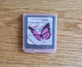 Nintendo DS Rosa con 4 Juegos