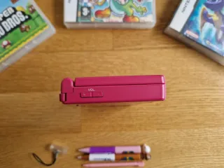 Nintendo DS Rosa con 4 Juegos