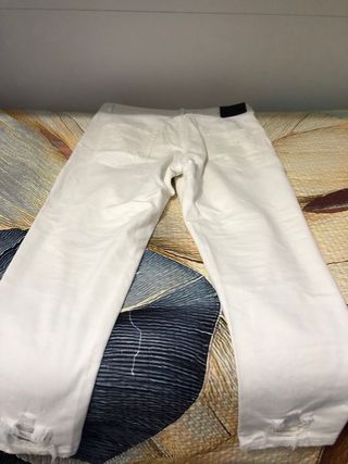 Jeans bianchi skinny strappati