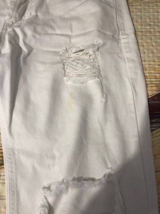 Jeans bianchi skinny strappati