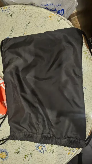 Mochila Adidas con cordones y estampado de perro