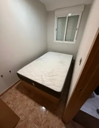 Canapé de tela y madera