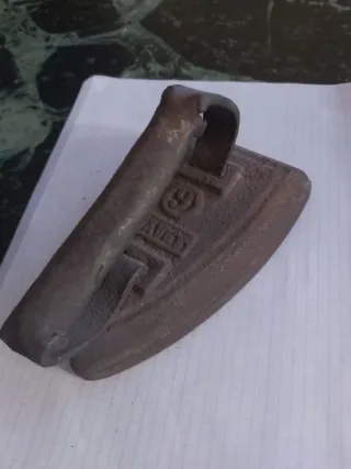 Plancha de hierro antigua