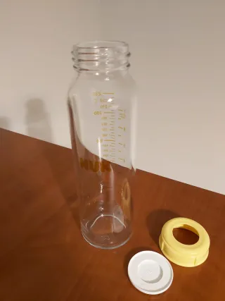 Biberón NUK Cristal 230ml con Tapa para boquilla.