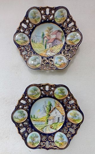 Piatti decorativi in ceramica con paesaggio