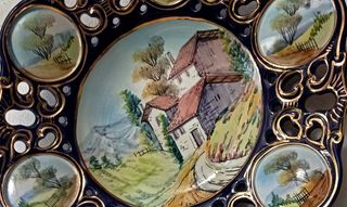 Piatti decorativi in ceramica con paesaggio