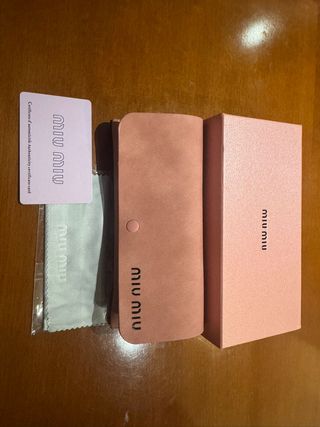 Gafas de Sol Miu Miu Doradas y Rosas