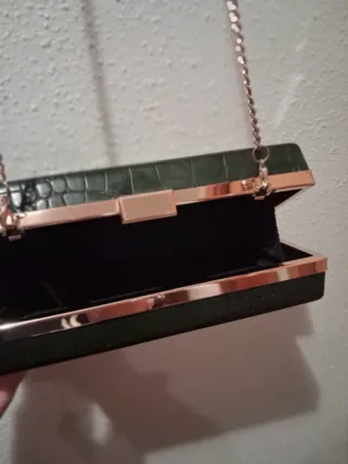 Bolso de fiesta verde oscuro y dorado