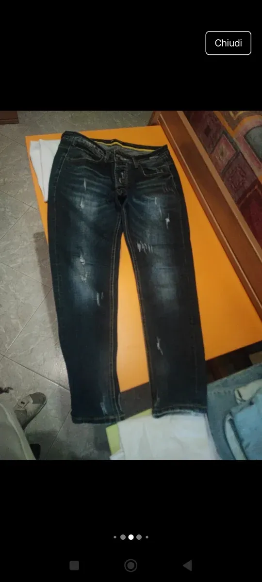 Completo uomo: polo bianco e jeans