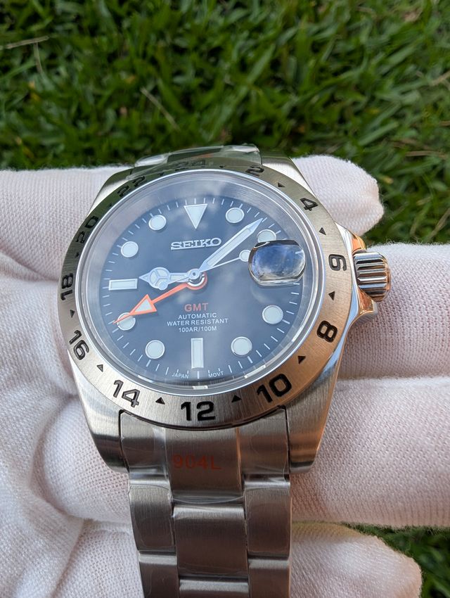 Reloj Seiko Mod Explorer II GMT Negro Naranja