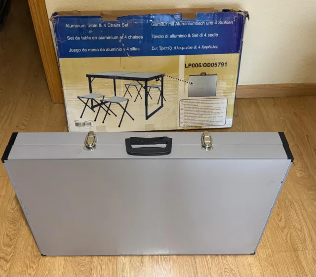 Mesa plegable aluminio con 4 sillas