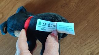 Peluche cane nero con collare rosso