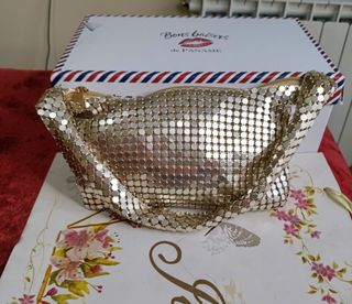 Bolso fiesta dorado forrado nuevo