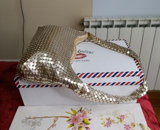 Bolso fiesta dorado forrado nuevo