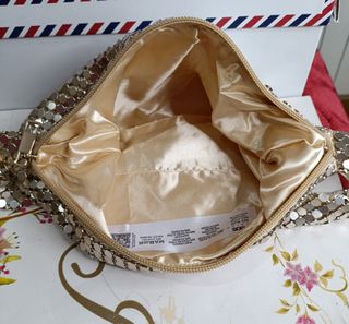 Bolso fiesta dorado forrado nuevo