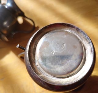 Lote de tres jarras de alpaca antiguas