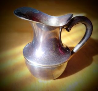 Lote de tres jarras de alpaca antiguas