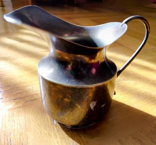 Lote de tres jarras de alpaca antiguas