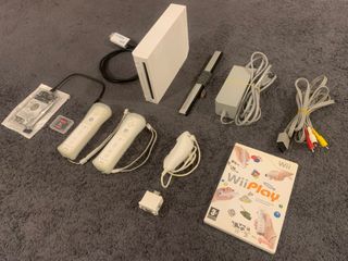 Wii, mandos y +100 juegos.